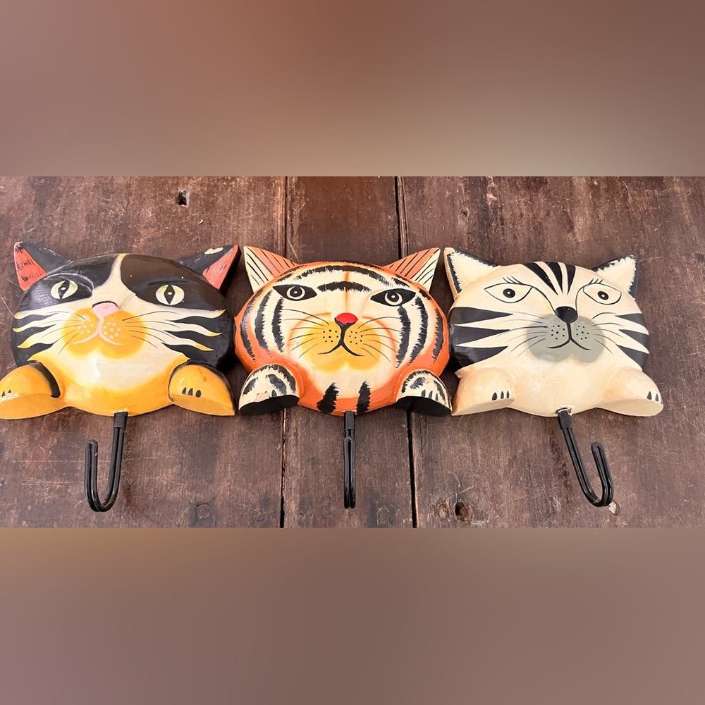 Vintage wall hanging with hooks.